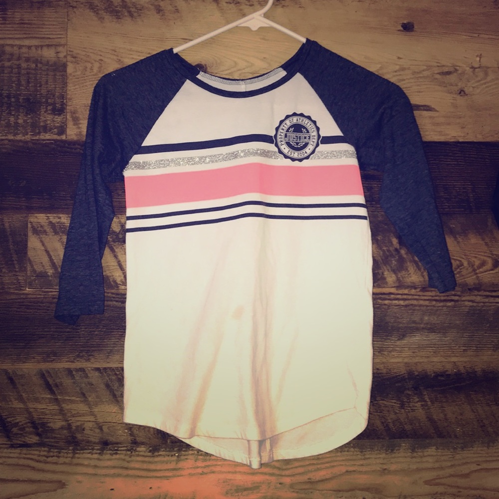 A blue pink black and glittery shirtfront Justice